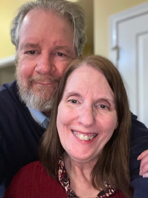 smiling husband and wife