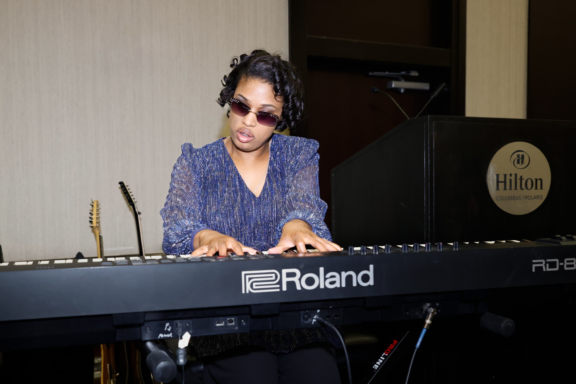 Musician who is blind playing piano
